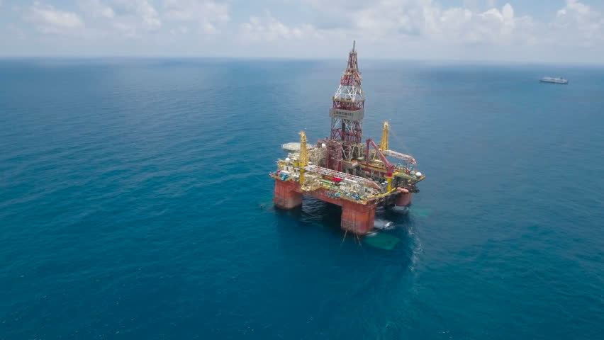 SOUTH CHINA SEA - JULY 2016: Flying towards a Chinese offshore oil drilling platform in the South China Sea, a strategic political and economic region with several conflicting territorial claims. Royalty-Free Stock Footage #19836856