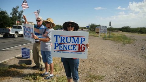Green Valley, Arizona, USA - 9-25-2016 - People supporting Donald Trump by holding signs at an intersection