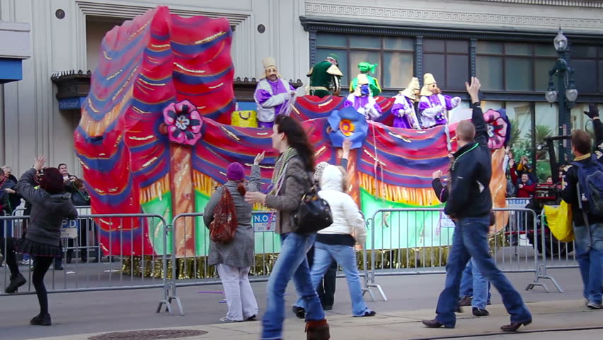 NEW ORLEANS, LA - February 11, 2012:  People in costume on a Mardi Gras float