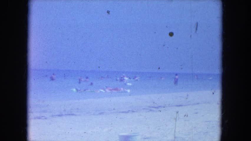 CLEARWATER, FLORIDA 1964: a beach scene is seen | Shutterstock HD Video #19869418