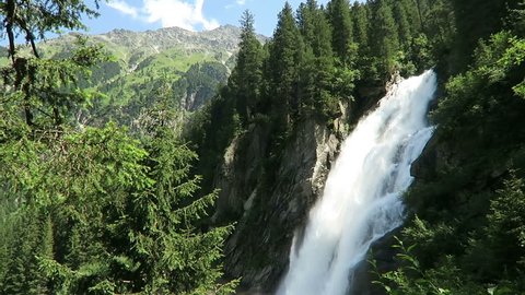 Krimml Waterfalls in Pinzgau, Salzburger Land at Austria. European Alps landscape with forest.