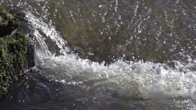 Barrage on Sarre River, Sarrebourg in Lorrraine, in the East of France, Slow motion