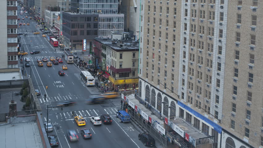 NEW YORK CITY  - Feb 11: Timelapse of Traffic at sunset passing by on 8th Avenue