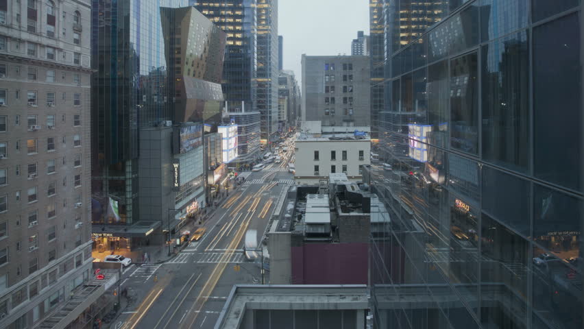 NEW YORK CITY  - Feb 11: Timelapse of Traffic and reflection at sunset passing