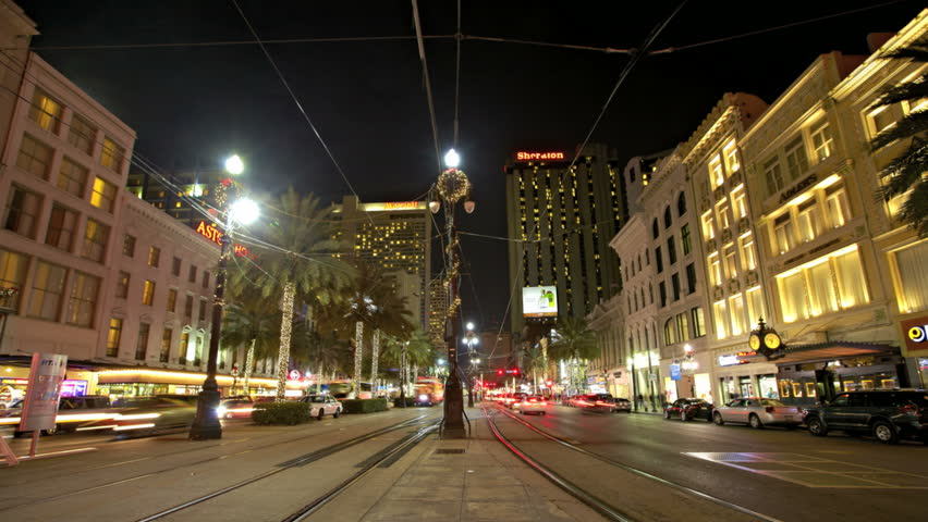 NEW ORLEANS  - DEC 09: Timelapse of a traffic in Canal Street at night on
