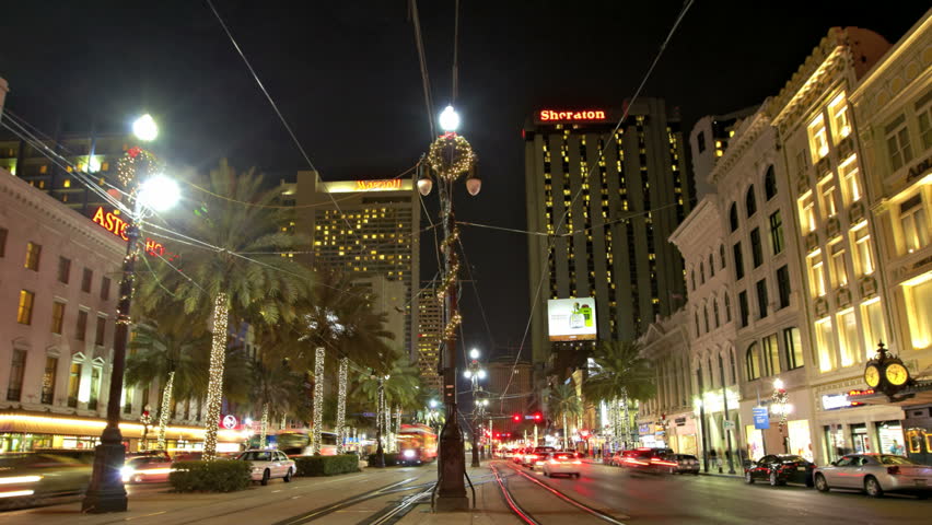 NEW ORLEANS  - DEC 09: Timelapse of a traffic in Canal Street at night on