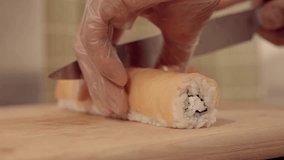 Cutting the sushi in slow motion