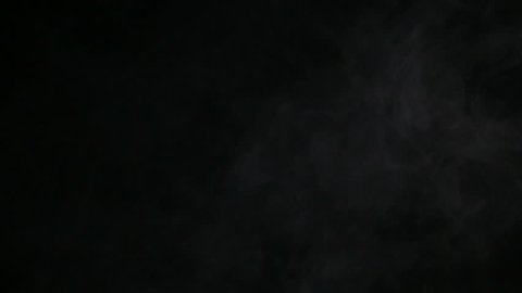 Real Smoke in slow Motion with a black background.