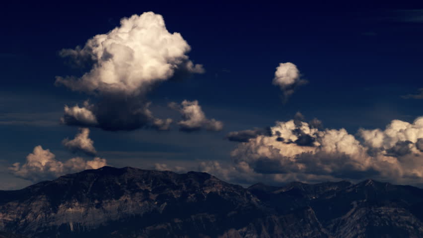 Time lapse of clouds and beautiful mountain range.