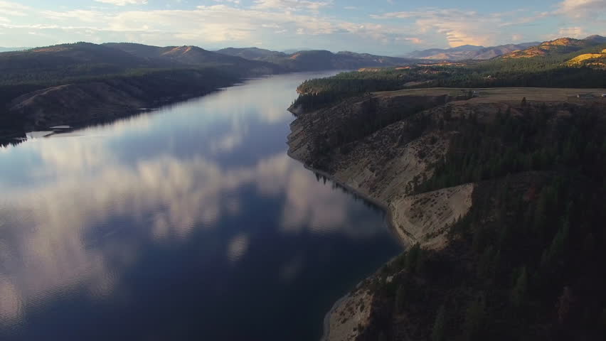 Amazing Aerial Over Lake Roosevelt, Washington at Sunset with Cloud Reflection in Water