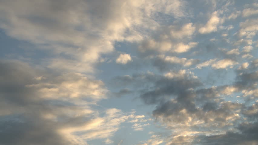timelapse evening sky, blue with white clouds