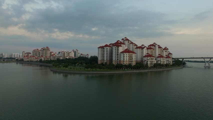 Aerial view of Singapore city skyline from drone in sunrise or sunset at Marina Bay, Singapore