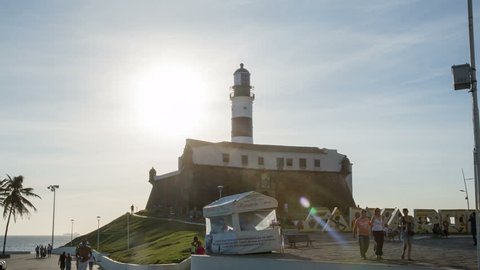 Hyper Lapse day to night, on the sunset of 
Barra's Lighthouse  or Santo Antonio Lighthouse, that is located in the  sunny city of Salvador, in the state of Bahia northeast coast in Brazil.