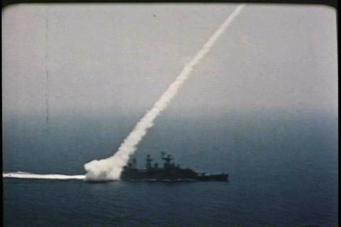 A missile is launched off a ship at sea. The largest warship in the world is taken for a drive in the 1960s. (1960s)