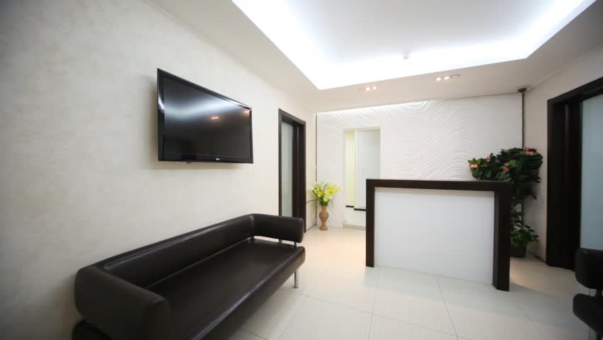 In Beauty Salon Hall There Are Two Black Sofas And Reception In Beauty Salon Hall There Are Two
