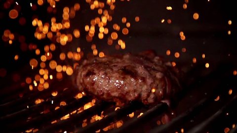 Cooking burger in slow motion