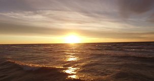 Sunset over the sea. The video was filmed in 4K with drone