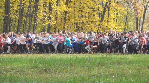 SAMARA, RUSSIA - SEPTEMBER 25, 2016 Children's marathon run in the autumn forest. .