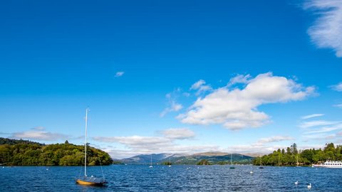 Lake Windermere timelapse including boats, ferries and blue sky with white clouds