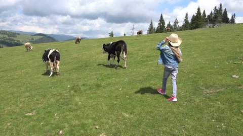 Farmer Child Pasturing Cows, Cowherd Girl Walking Cattle in Mountains