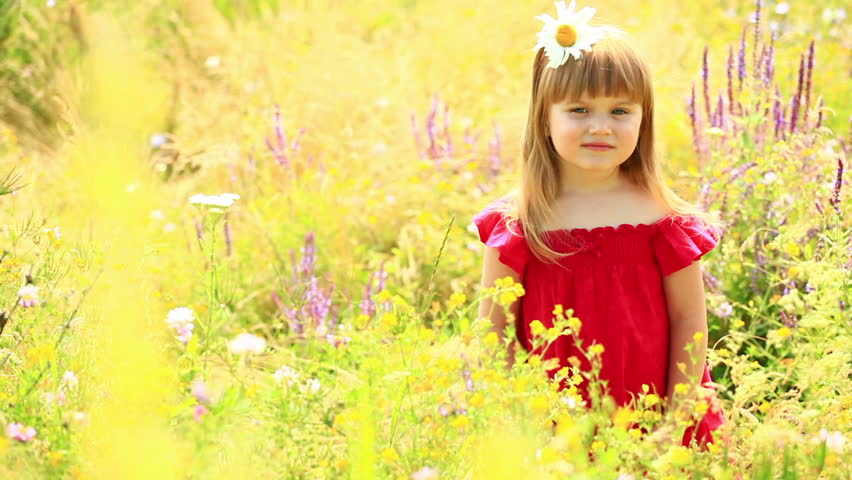 Girl jumping out of flowers