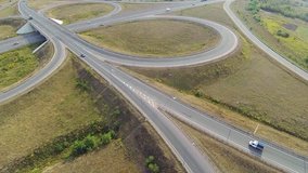 Aerial shot of highway junction, drone follow the truck