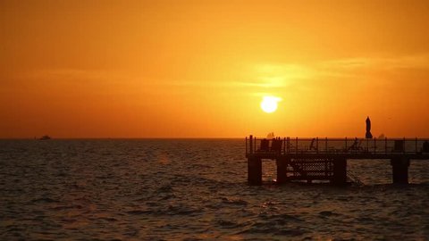Sunset, ocean side on deck 