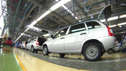 TOLYATTI - SEP 30: (Timelapse View) Cars are move on pipeline in assembly shop on plant AUTOVAZ, on Sep 30, 2011 in Tolyatti, Russia
