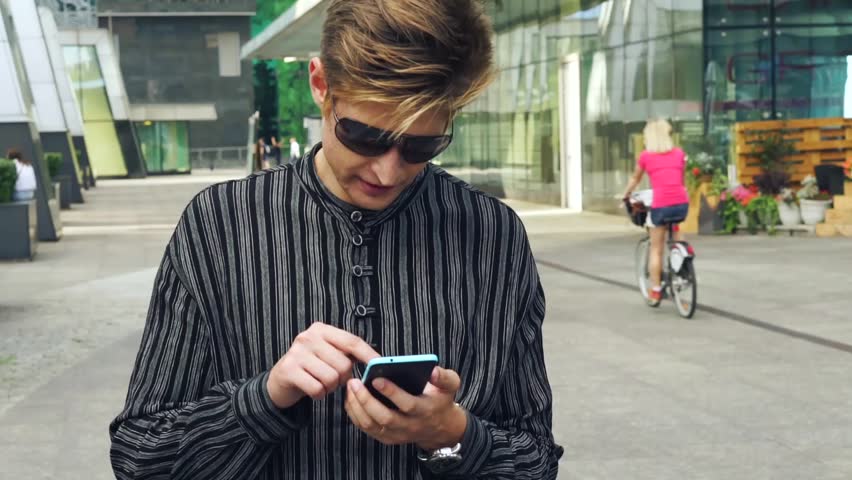 Man typing a message on your phone