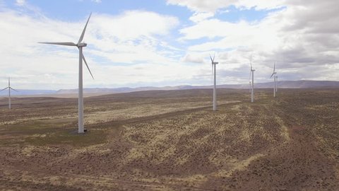 Wind Turbines in Desert Spinning for Clean Energy Captured by Drone