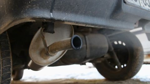 exhaust pipe of an old little car 