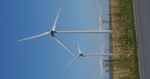 Wind Turbines with Blue Sky, near Caen in Normandy, Real Time 4K