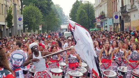 LONDON, UNITED KINGDOM - AUGUST 29, 2006 - Notting Hill carnival. Procession of  percussions and drums in costume