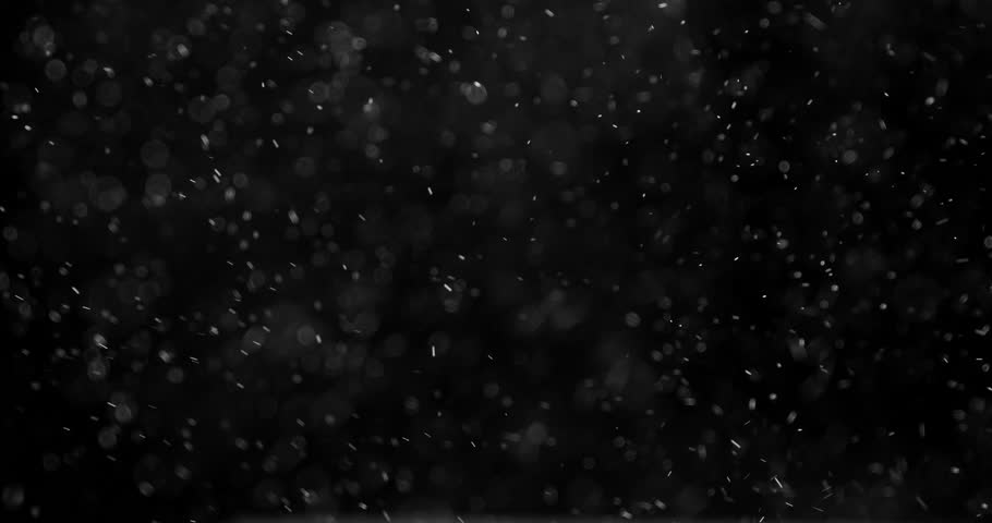 Chaotic Wildness Microparticles. Small white particles flow in the air on a black background to simulate snow, blizzard, or a microcosm of the Christmas magic. Filmed at a speed of 120fps | Shutterstock HD Video #20071456