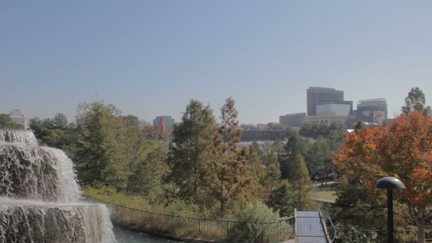 cascading water with downtown Columbia South Carolina in the background