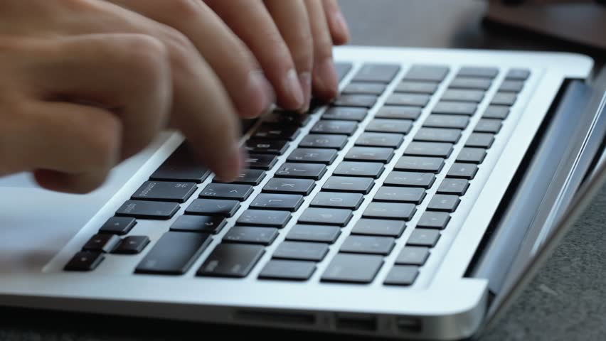 Typing a keyboard on the laptop, Apple macbook air