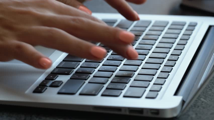 Typing a keyboard on the laptop, Apple macbook air