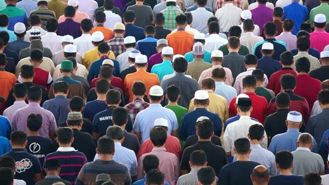 PUTRAJAYA - SEPT 23, 2016: Muslim performing Friday prayers at Tuanku Mizan Mosque on September 23, 2016 in Putrajaya Malaysia. Friday prayer is perform just after noon in the place of dhuhr