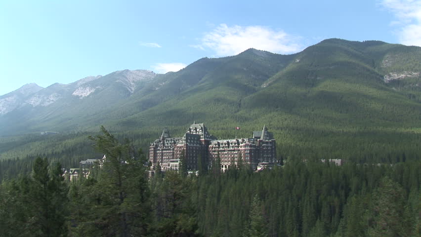 Banff Springs Hotel in the trees in Banff National Park, Alberta ...