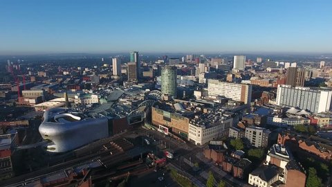 Aerial panning panoramic view of Birmingham city centre in the UK.