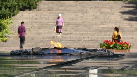 ALMATY, KAZAKHSTAN - SEPREMBER, 2016: Eternal Fire on the memorial of 28 Heroes of the Second World War, who under the command of General Panfilov have participated in the defense of Moscow in 1941.
