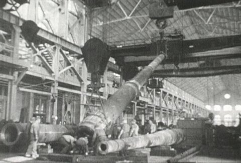 EUROPE - CIRCA 1942-1944: World War II, weapon making bomb gun tank montage