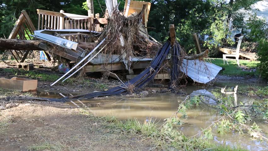 Beckley, West Virginia, June 2016: Exterior Shot on Homes of Flood Damage with Standing Water in Yard