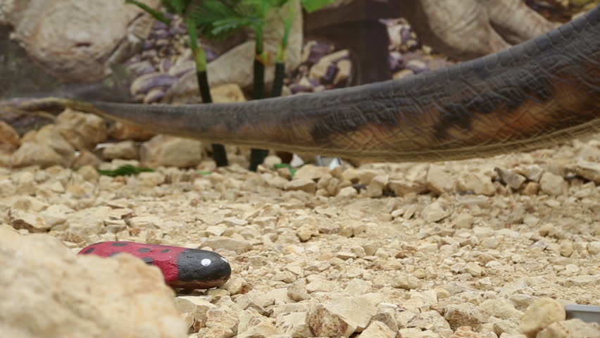 KAZAN, TATARSTAN REPUBLIC/RUSSIA - JULY 20: Moving tail artificial dinosaur in amusement park dinosaur on July 20, 2016 in Kazan