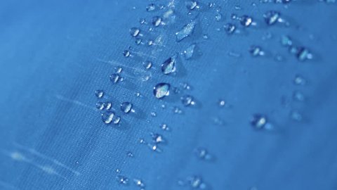 water droplets bounce off the waterproof cloth