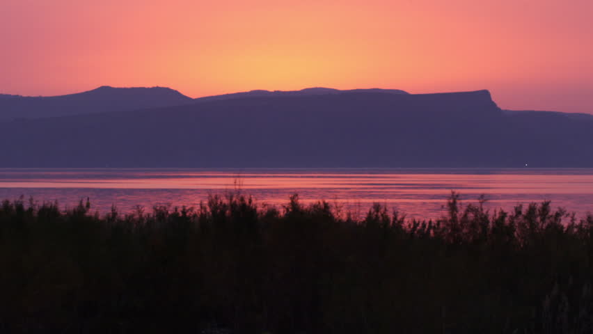 The Sea of Galilee at sunset shot in Israel.
