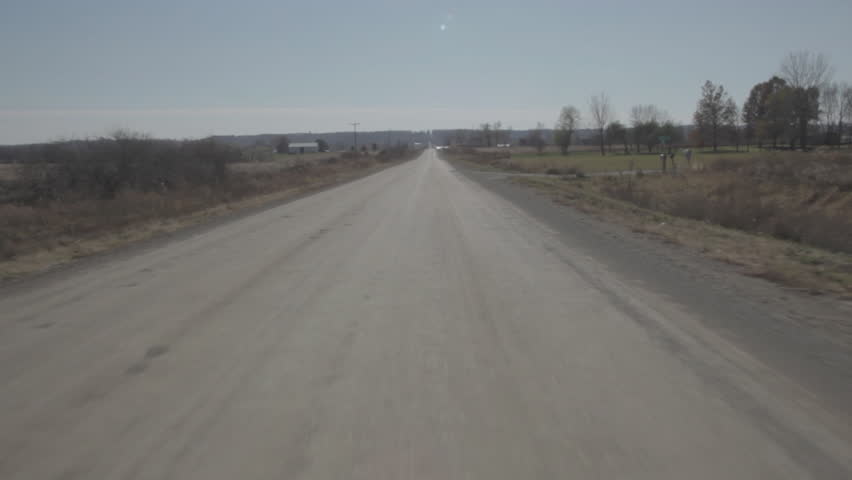 Driving Past Farmlands in Iowa