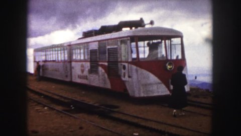 COLORADO 1958: touring railcars on a cloudy day