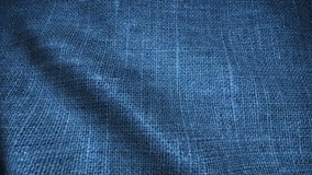 Realistic Ultra-HD jeans cloth waving in the wind. Seamless loop with highly detailed fabric texture