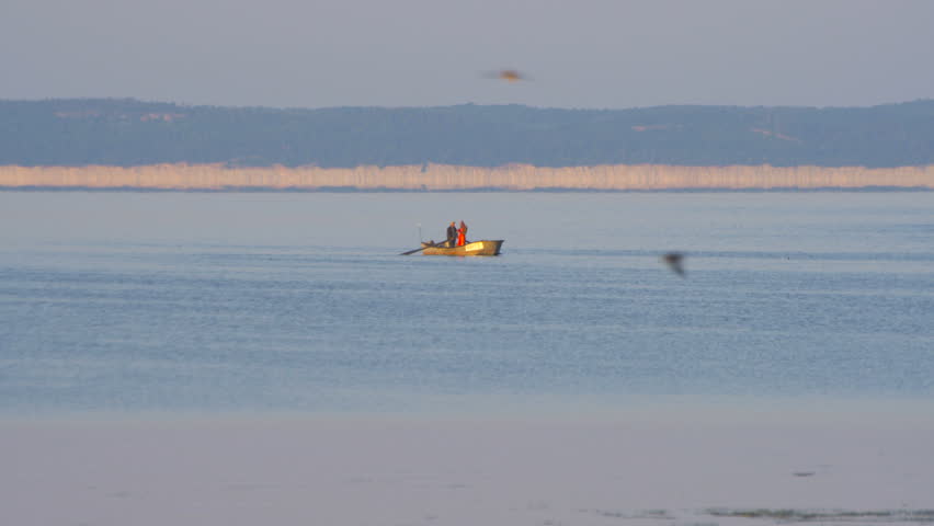 Fisherman pulling the net